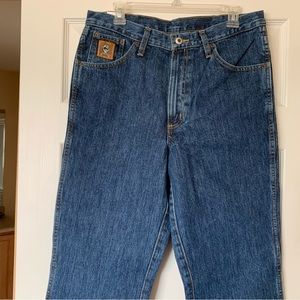 CINCH BRONZE LABEL MENS SLIM FIT DARK STONE WASHED JEANS.